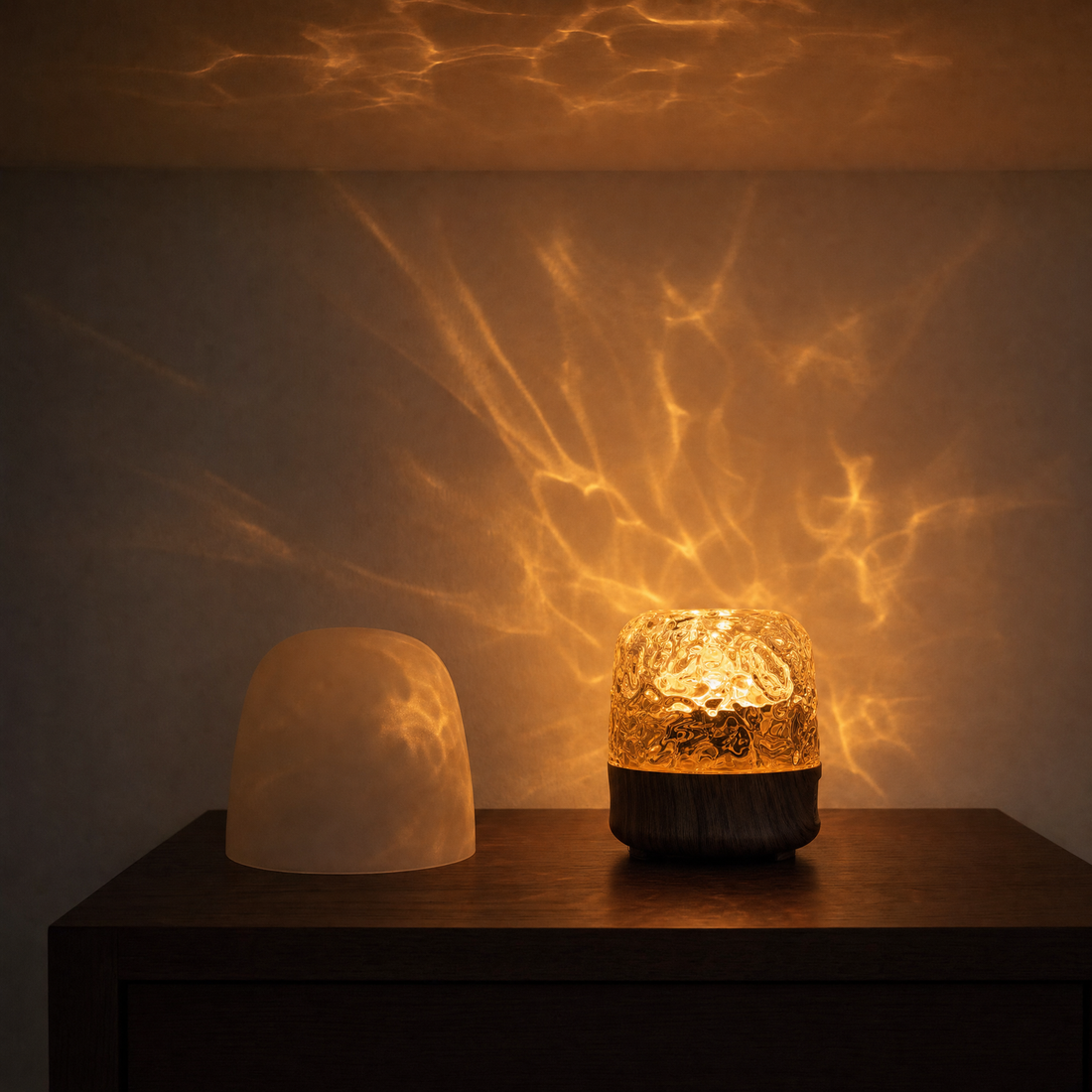 The Solis Lumen with its dome removed, throwing amber water-caustic ripples across a wall and ceiling in a dark room