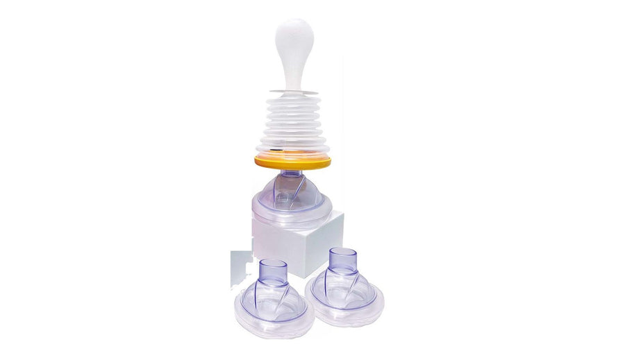 Suction anti-choking device with a face mask fitted and two spare masks
