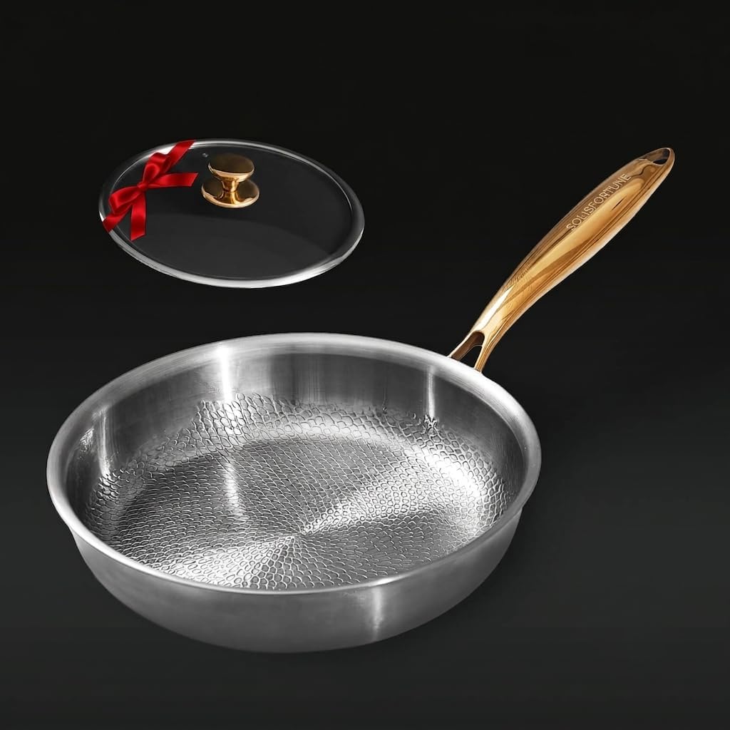 Solis Forge 12-inch hammered titanium frying pan with its tempered glass lid and wooden-look handle on a dark background