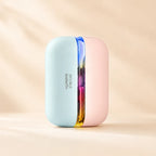 Solis Ember twin hand warmers in the Blue Pink colourway, the pale blue and pink halves standing together