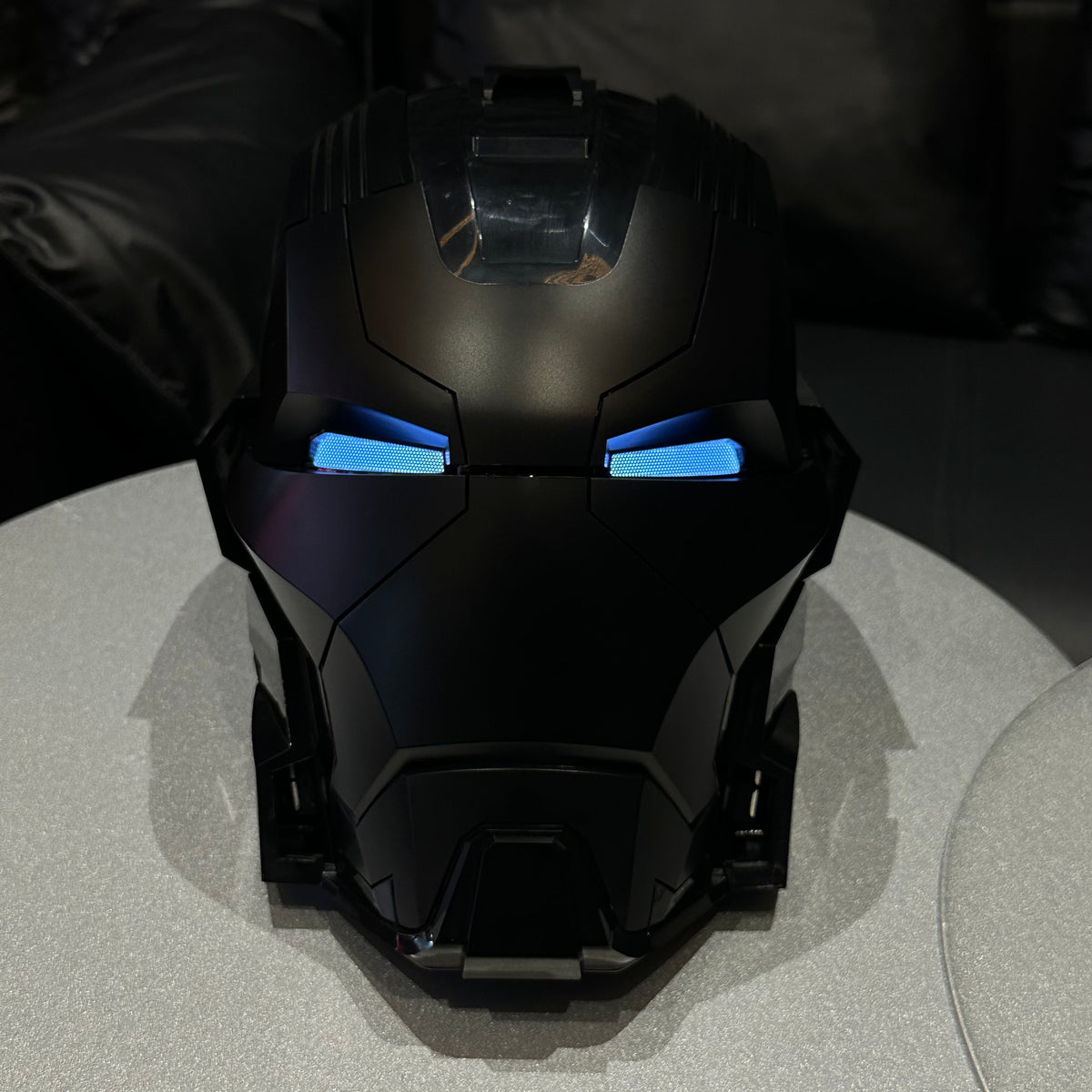 Solis Aegis MK-XVII helmet in Dark Edition — blue eyes lit