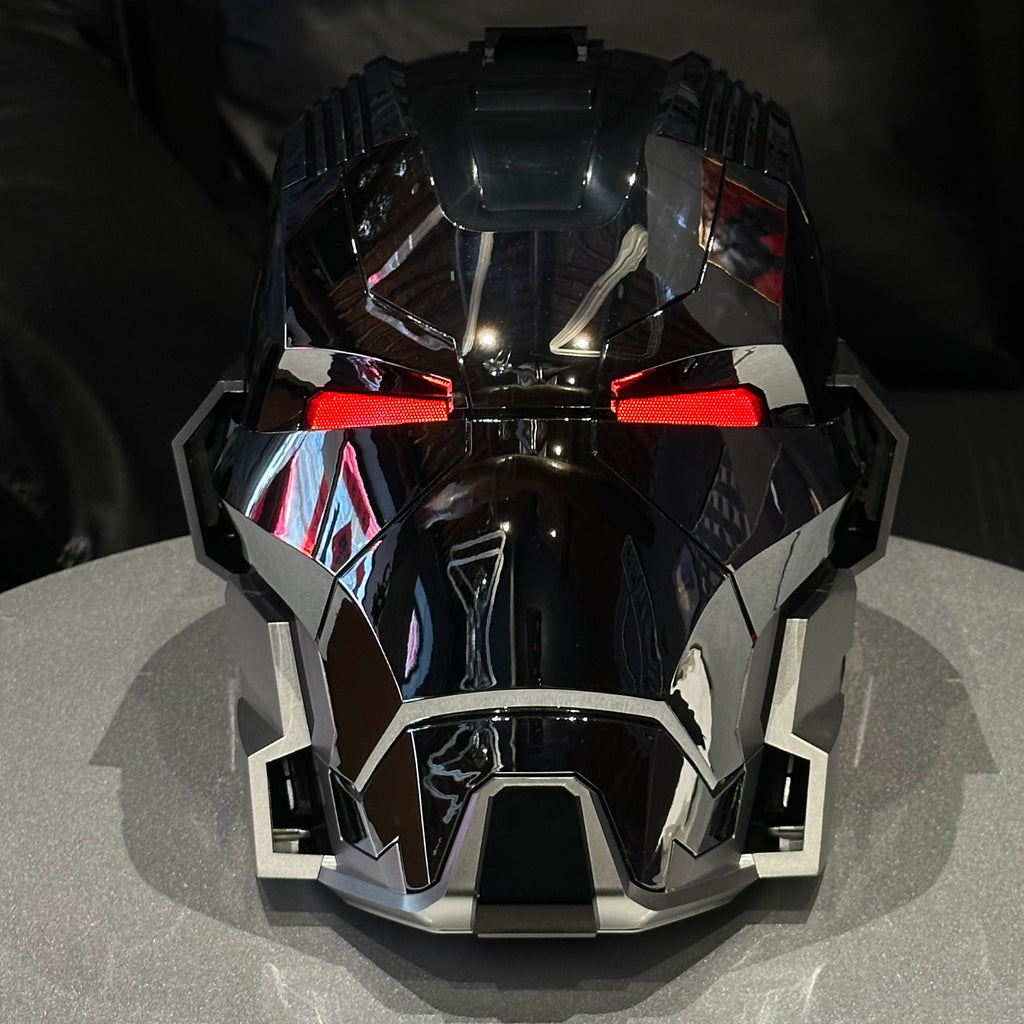 Solis Aegis MK-XVII helmet in Silver & Black — front view on a stand