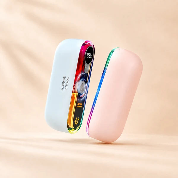 Solis Ember twin hand warmers split into its two halves, one pale blue with the lit control screen and one pink
