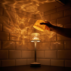 The Solis Vesta with the dome lifted, throwing water-ripple light across a tiled wall