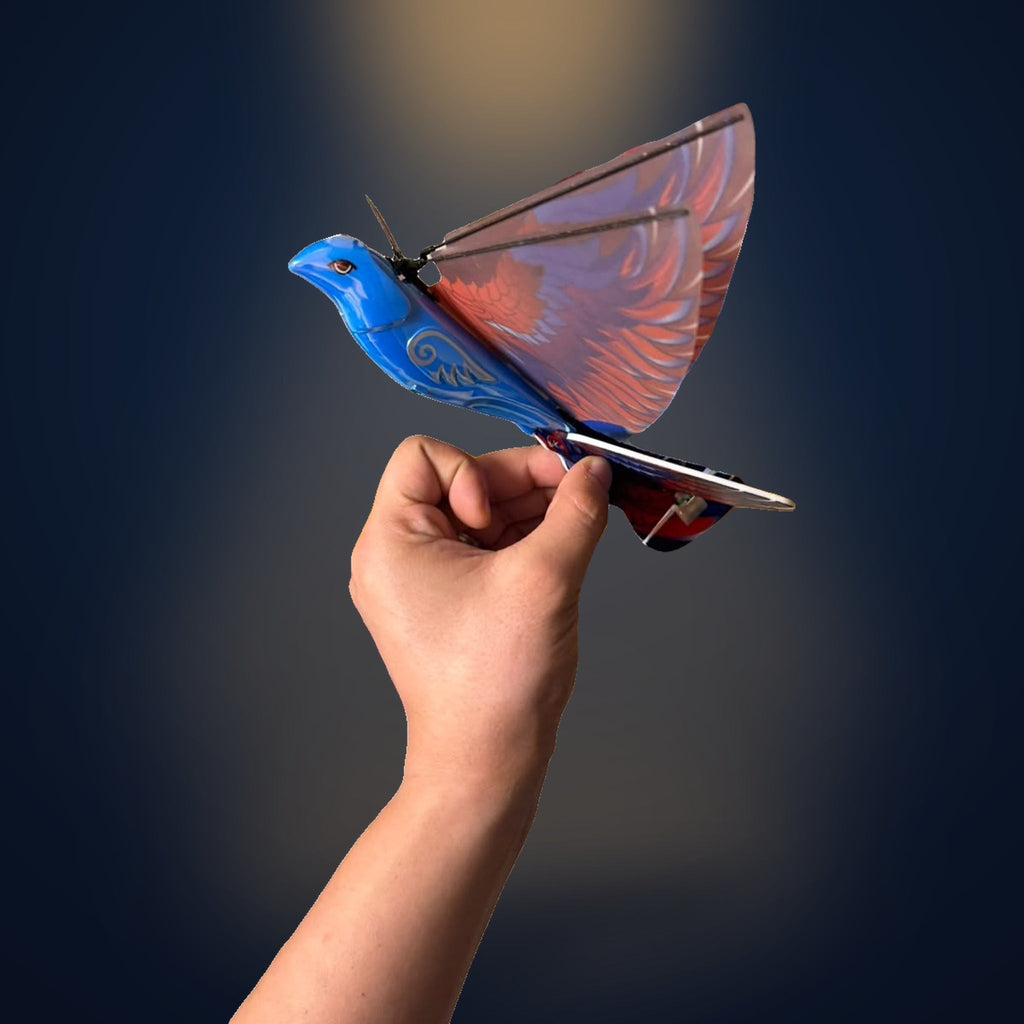 The real Solis Falco held in the hand in profile, for scale