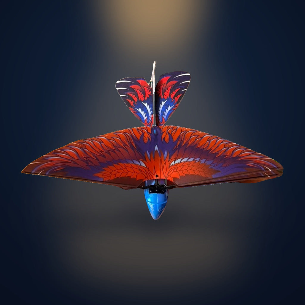The real Solis Falco head-on, wings spread wide, showing the full wingspan and the blue moulded body beneath