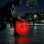 Solis Arc LED Basketball — dribbled on an outdoor court after dark