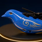 Macro detail of the Solis Falco's bright blue moulded body, the gold swirl decal, the amber eye, the wing-root gearbox, the USB-C charging socket and the power slide switch