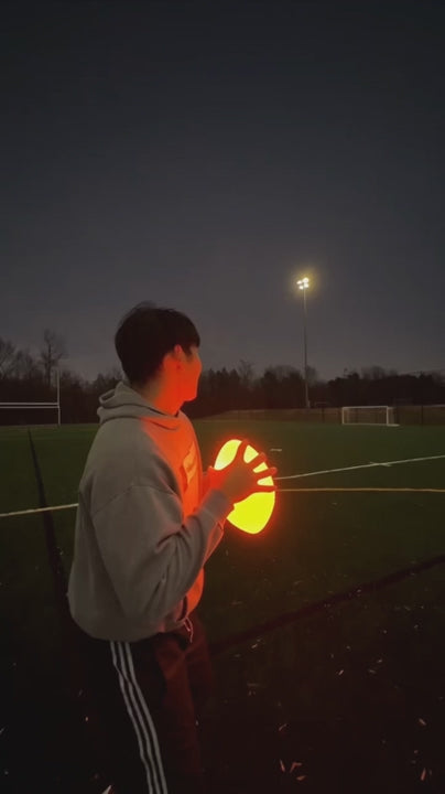 Solis Nightfall LED Football in use after dark