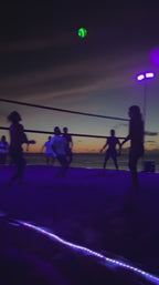 Solis Nightfall Glow-in-the-Dark Volleyball in use after dark
