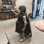 Solis Armory — Doctor Doom figure raising a hand, side view