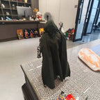 Solis Armory — Doctor Doom figure from behind, showing the fabric cape