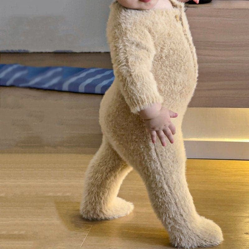 Close-up of the fuzzy texture of the Solis Bear Cub Romper