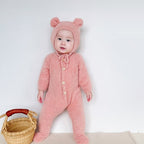 Solis Bear Cub Romper — Pink: fuzzy footed romper with bear-ear bonnet