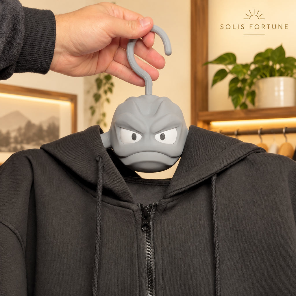 Solis Boulder — rock clothes hanger holding a black hoodie in a gaming room