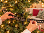 Solis Branchline — snapping the curved track sections together inside the tree