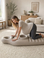 Solis Bumpnest — pregnant woman kneeling onto the mattress on a living room rug