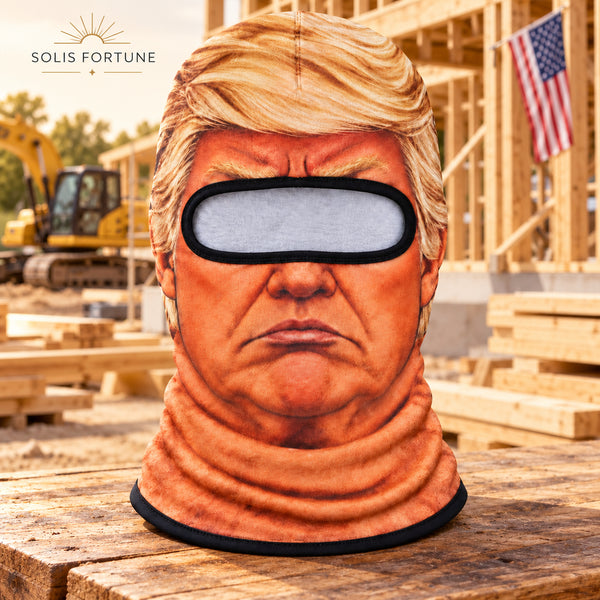 Solis Chief Face — President face ski mask with golden hair on a neutral studio workbench