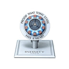 Iron Man arc reactor wireless charger, front view on its brushed aluminium stand, engraved Proof that Tony Stark has a heart