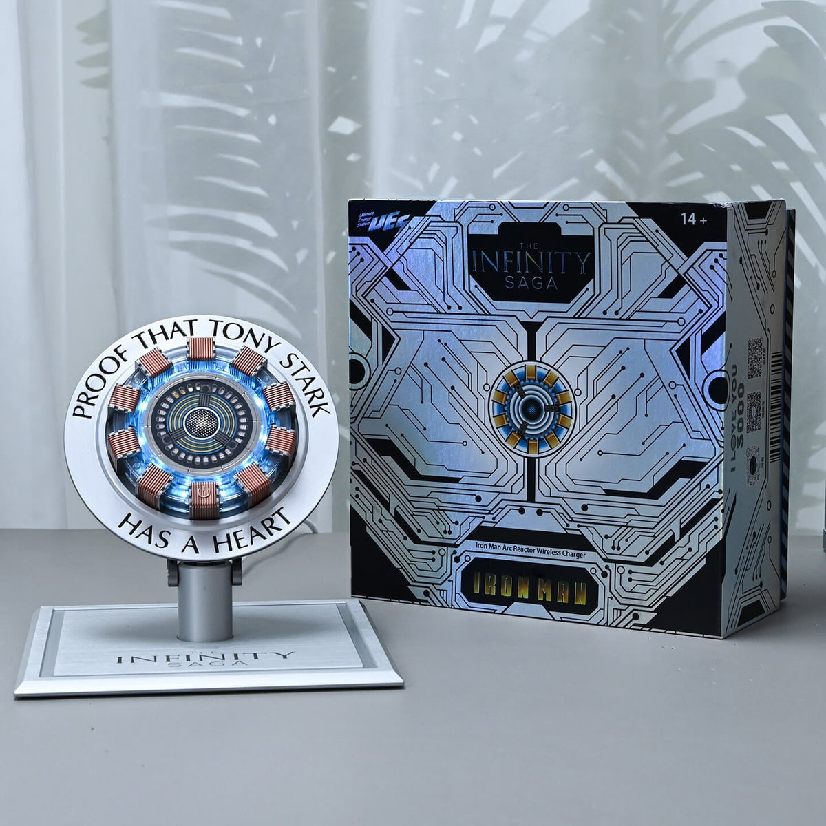 Iron Man arc reactor wireless charger next to its gift box