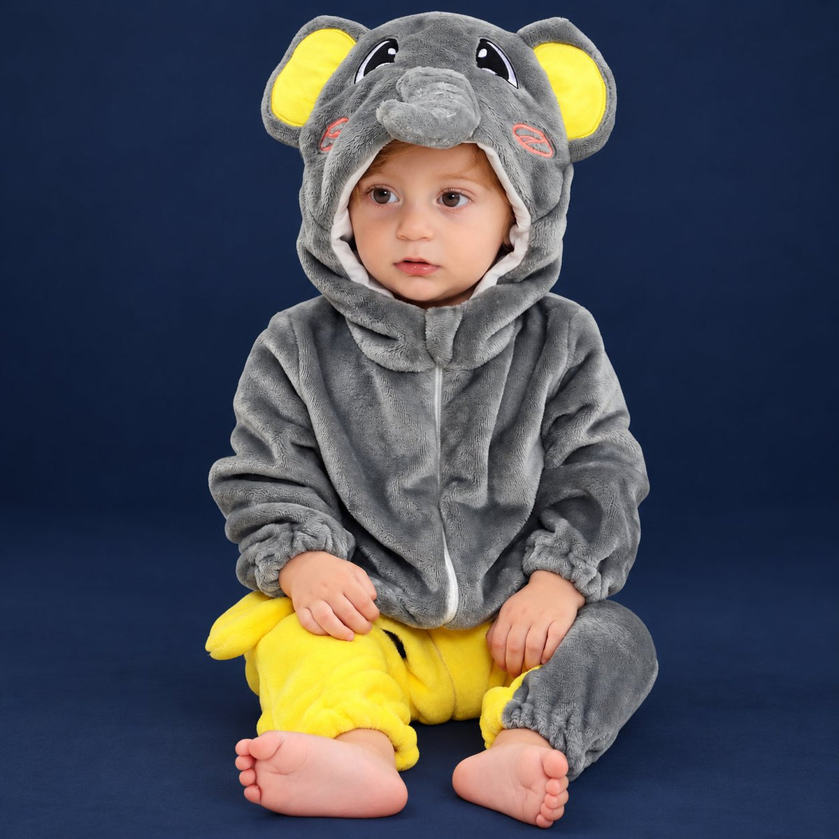 Solis Critter Onesie — Elephant: flannel hooded animal romper worn by a baby