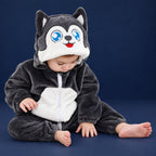 Solis Critter Onesie — Husky: flannel hooded animal romper worn by a baby