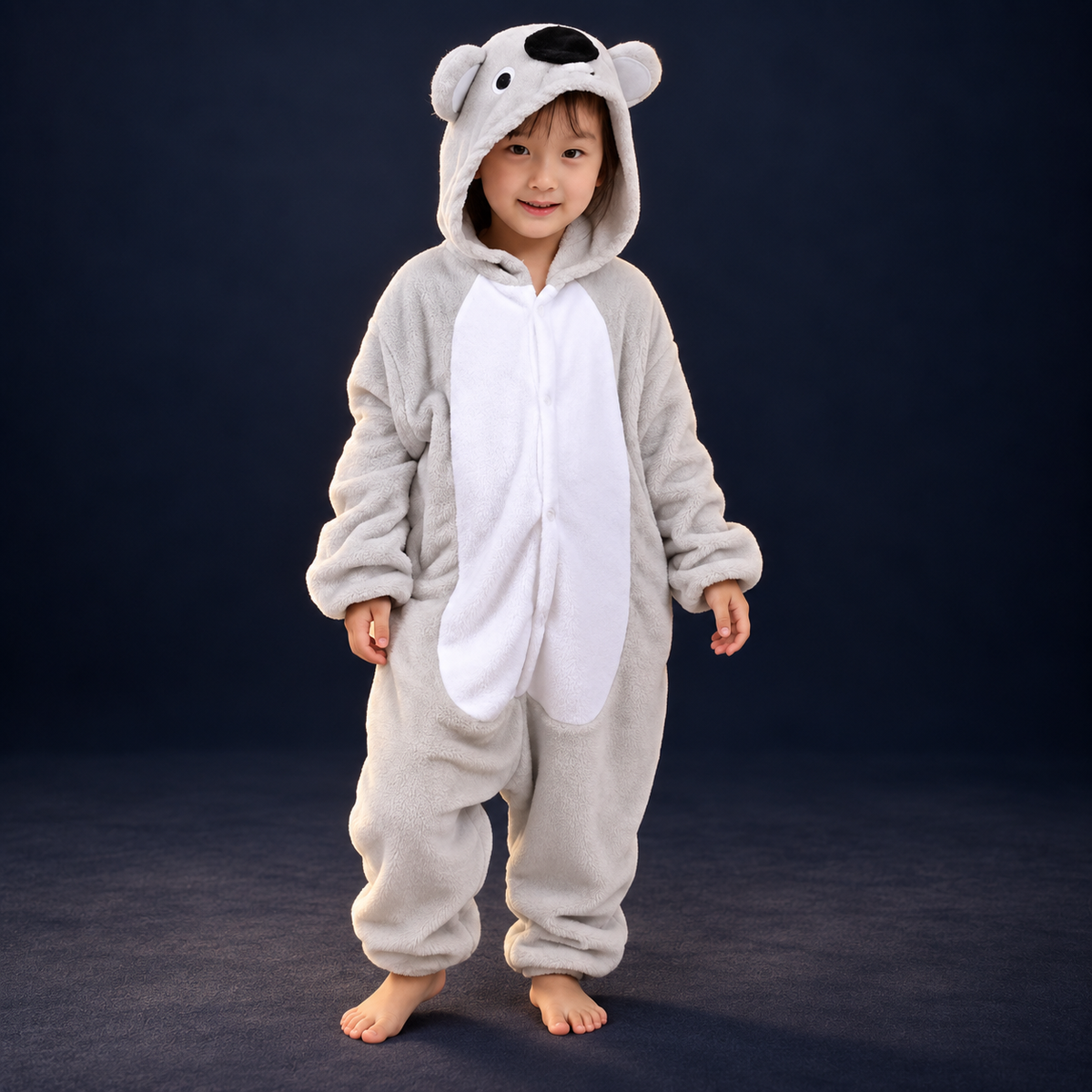 solis critter onesie kids koala — Koala worn by a child on a dark navy studio background