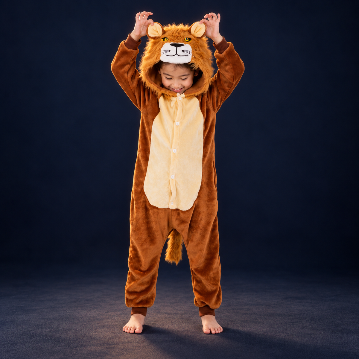 solis critter onesie kids lion — Lion worn by a child on a dark navy studio background