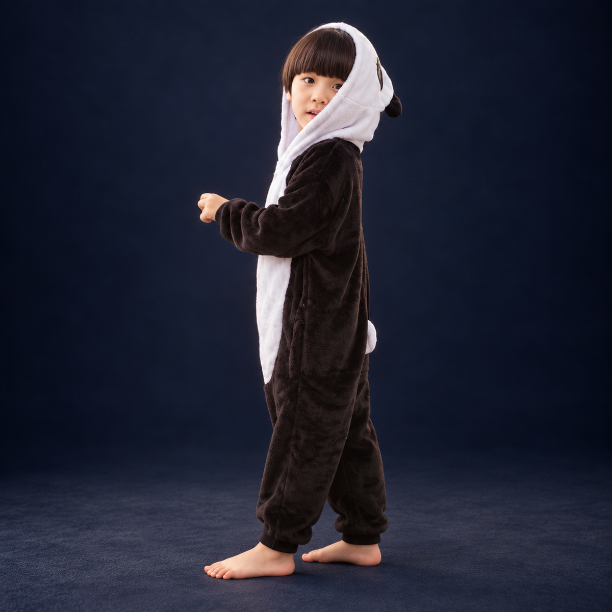 solis critter onesie kids panda — Panda worn by a child on a dark navy studio background