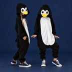 Solis Critter Onesie Kids — Penguin: hooded flannel animal jumpsuit on a child