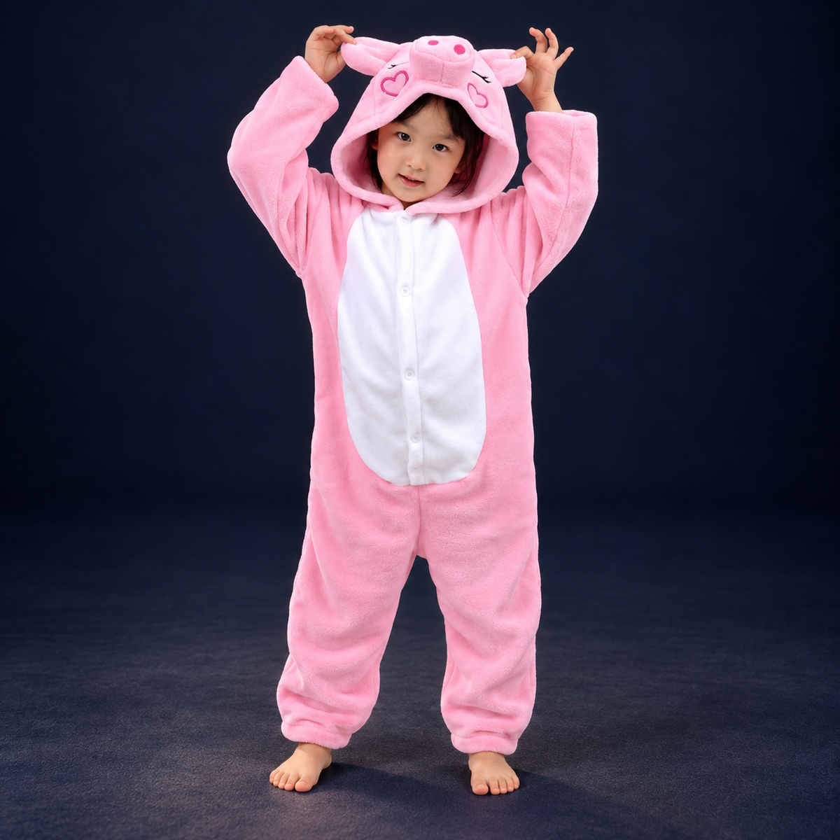solis critter onesie kids pink pig — Pink Pig worn by a child on a dark navy studio background
