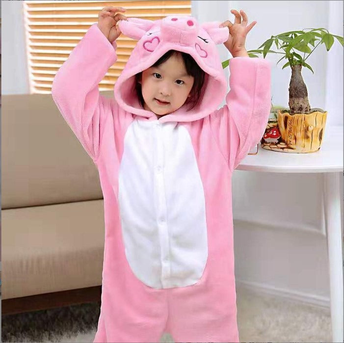 Solis Critter Onesie Kids — Pink Pig: hooded flannel animal jumpsuit on a child