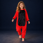 solis critter onesie kids red dino — Red Dino worn by a child on a dark navy studio background