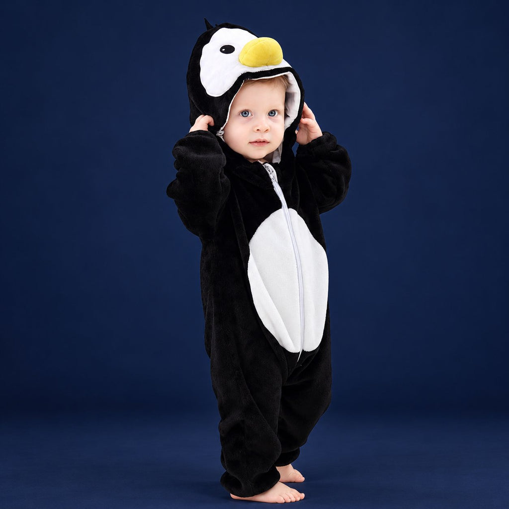 Solis Critter Onesie — Penguin: flannel hooded animal romper worn by a baby