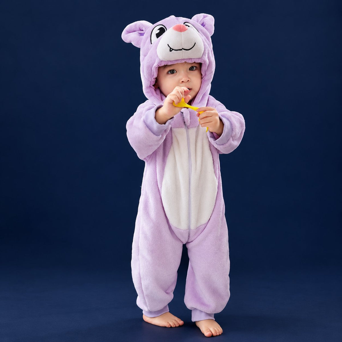 Solis Critter Onesie — Purple Bat: flannel hooded animal romper worn by a baby