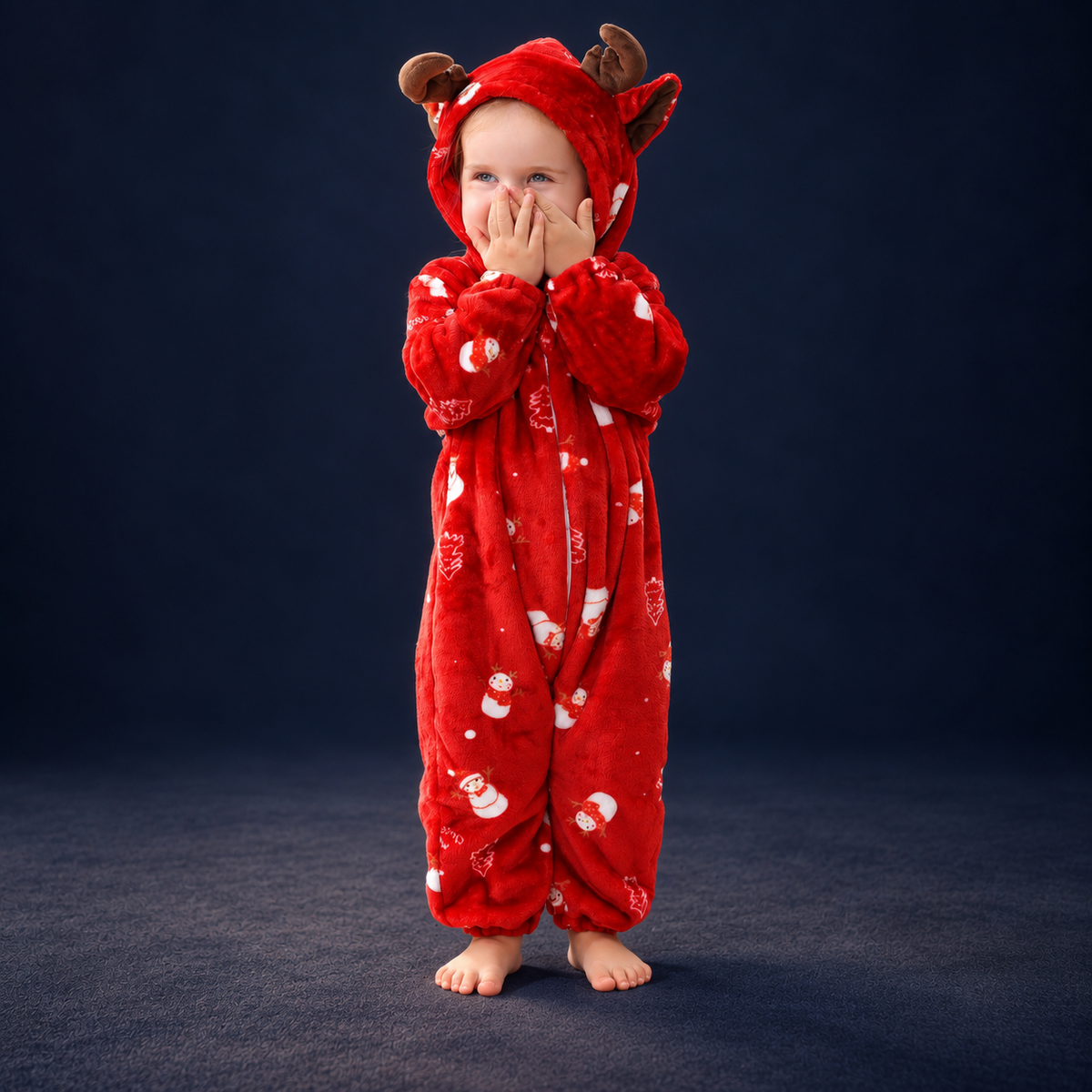 solis critter onesie snowman — Snowman worn by a child on a dark navy studio background