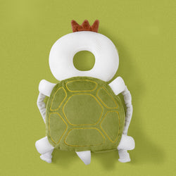 Solis Cushy — turtle toddler head protector, mesh design — a green shell cushion with a padded head ring