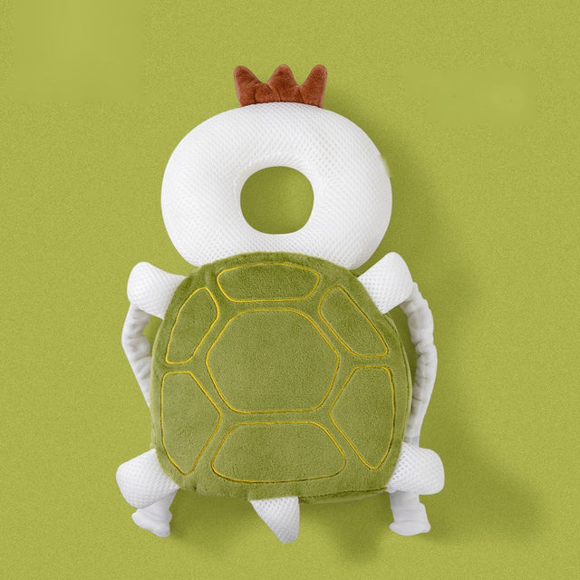 Solis Cushy — turtle toddler head protector, mesh design — a green shell cushion with a padded head ring