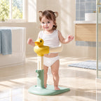 Solis Duckling Bath Stand: toddler standing at the duck handrail in a shower