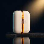 Solis Ember Twin Hand Warmers — hero shot on a dark stone ledge