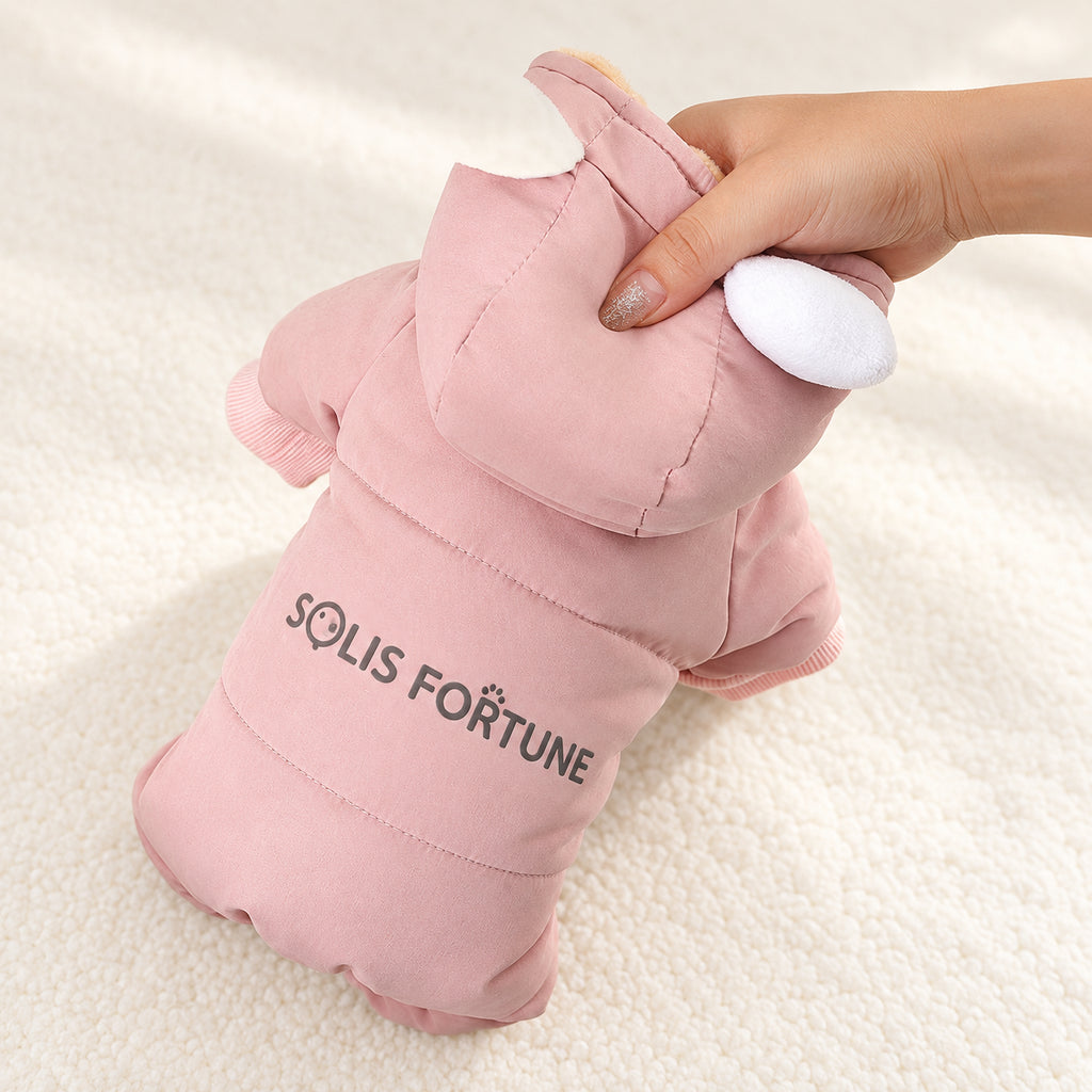 Solis Frostpaw — padded pink dog jumpsuit held up to show the thick fill