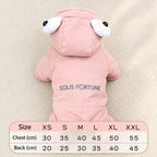 Solis Frostpaw — pink dog winter jumpsuit with cartoon-eye hood