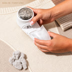 Solis Fuzzaway — sliding out the detachable lint collector full of fuzz