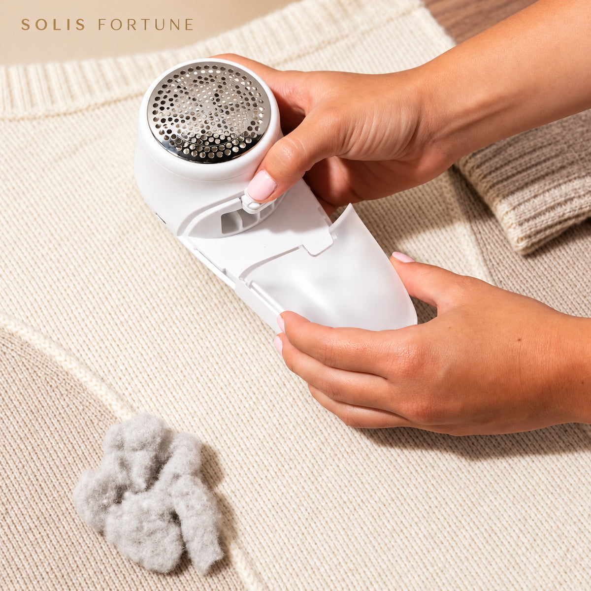 Solis Fuzzaway — sliding out the detachable lint collector full of fuzz