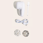 Solis Fuzzaway — in the box: shaver, cleaning brush, USB-C cord and 2 extra blades