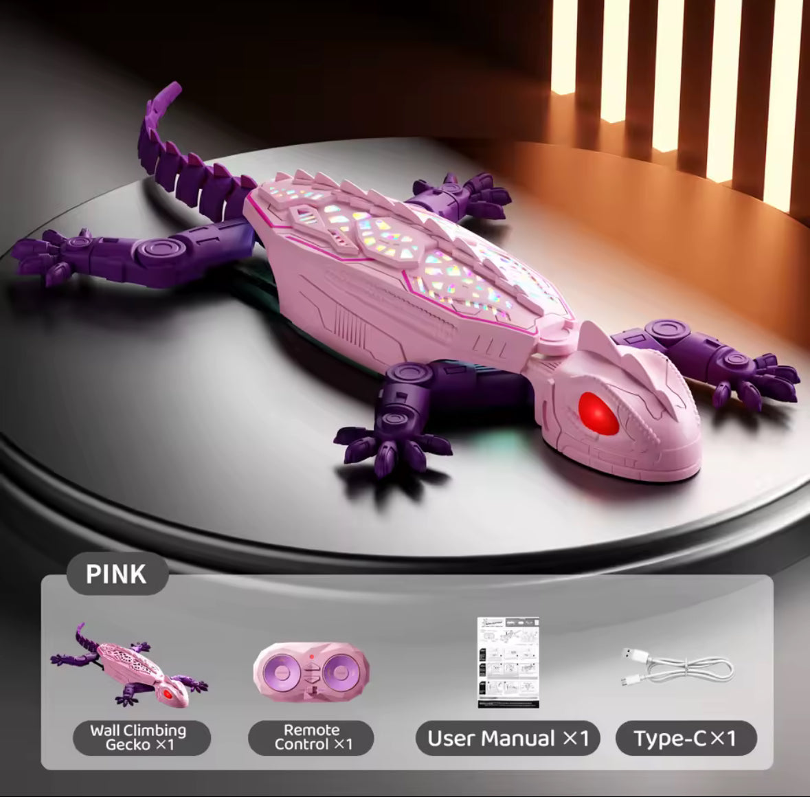 Solis Gekko — pink wall climbing gecko with remote control, USB-C cable and manual