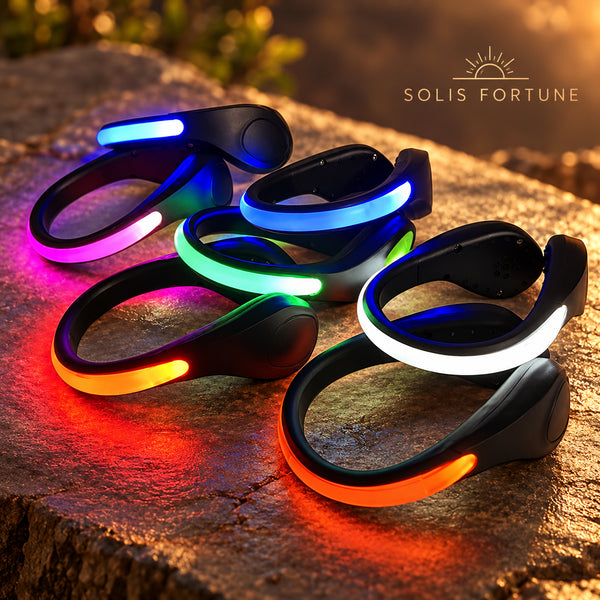 Solis Glowstep — pair of LED shoe clip lights glowing in several colours