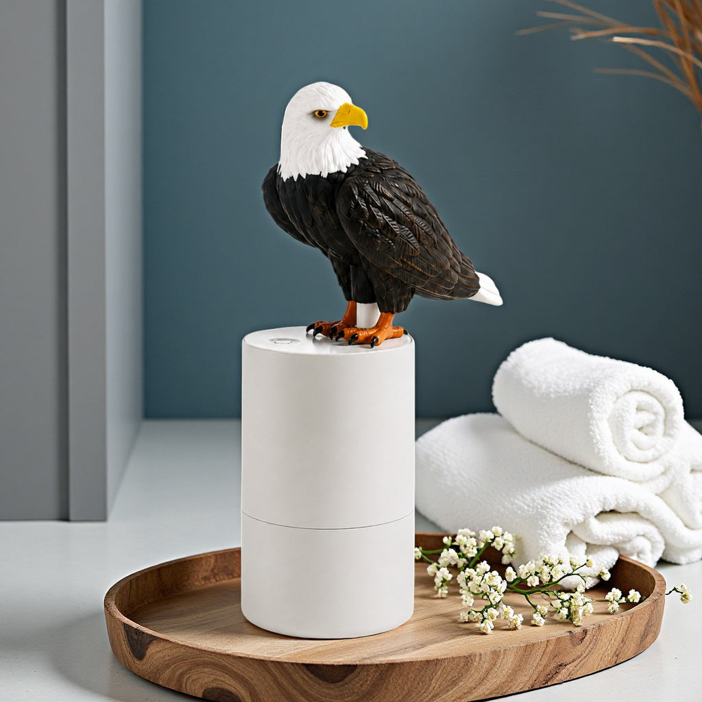 Solis — bald eagle foam soap dispenser on a white touchless base