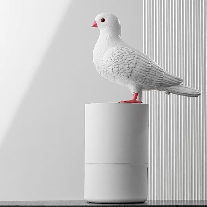 Solis — white dove soap dispenser on a white base, touchless foam pump