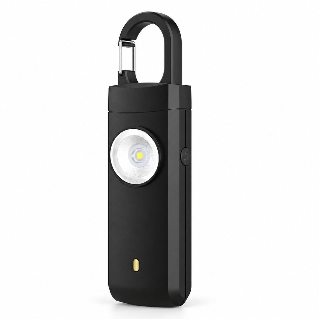 Solis Guardian — personal safety alarm in black with carabiner clip and LED flashlight